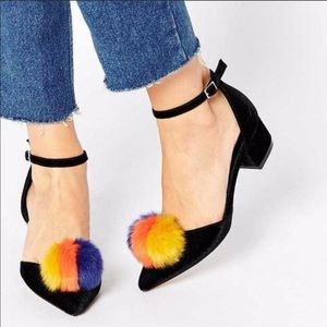 Black closed toe shoes with colorful Pom Pom